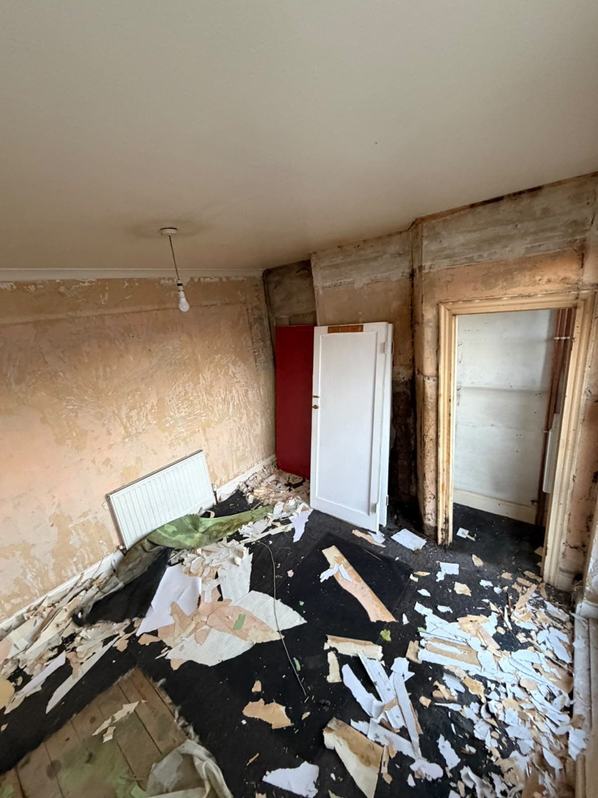 Hampden Square before works: stripped living space