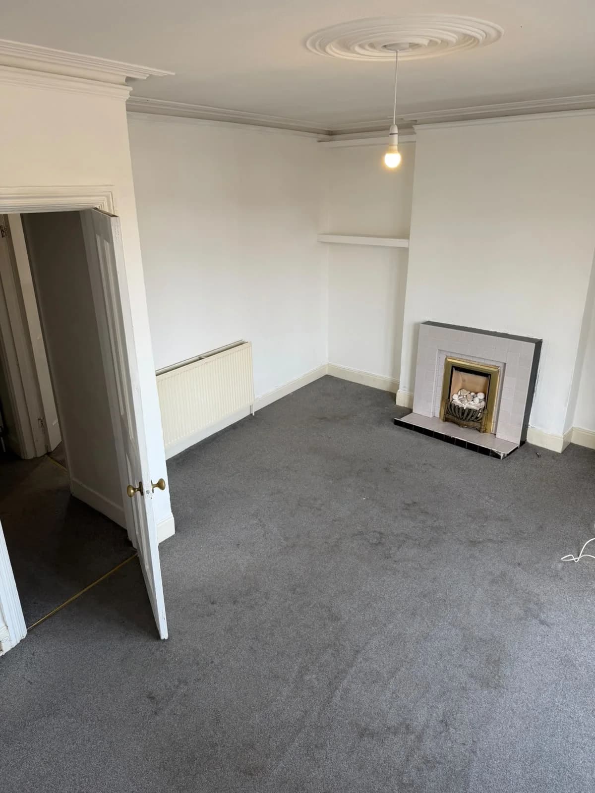 Lancaster Road living-fireplace before renovation
