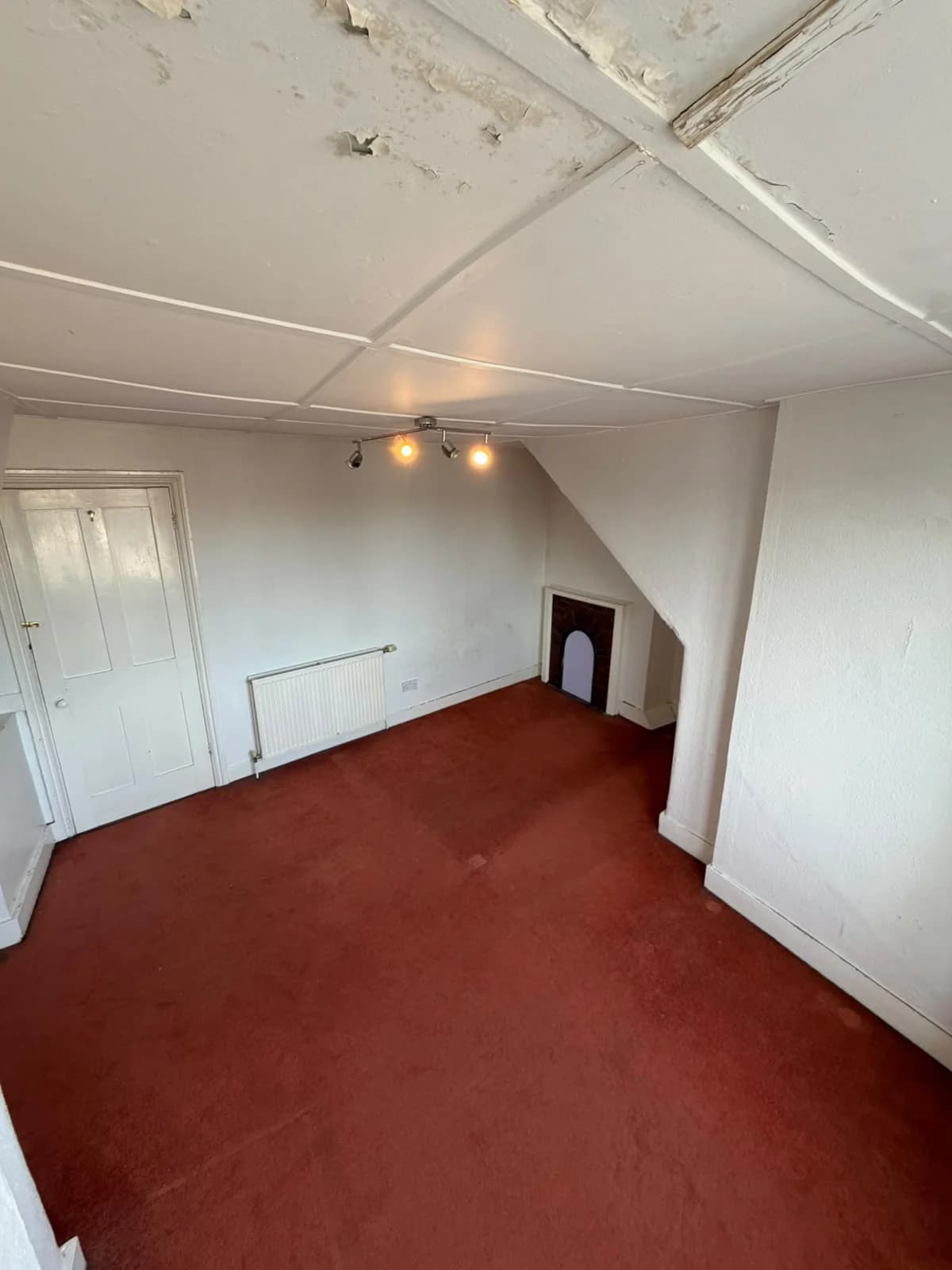 Lancaster Road loft-fireplace before renovation